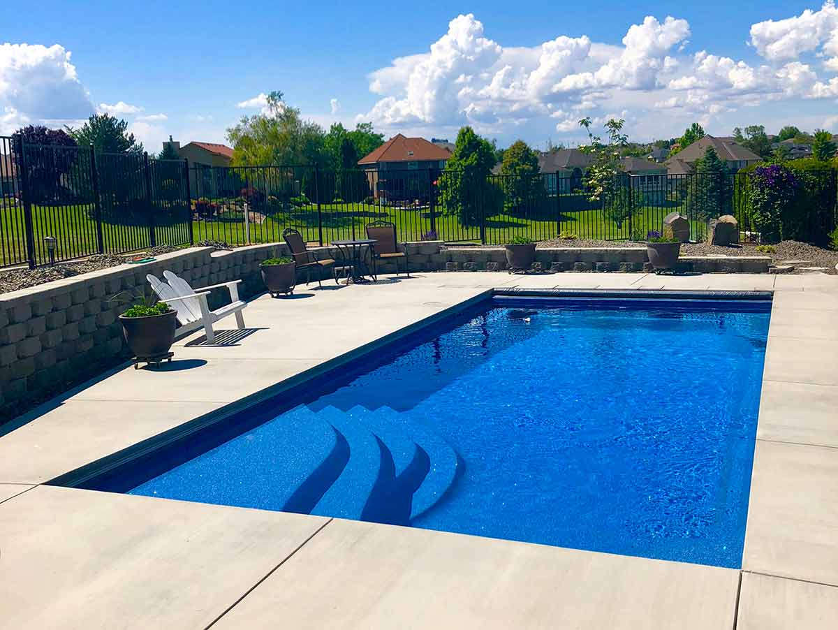 OLYMPIA 12 Family enjoying custom swimming pool built by Copano Pools and Spas in Selma, TX</p><p>